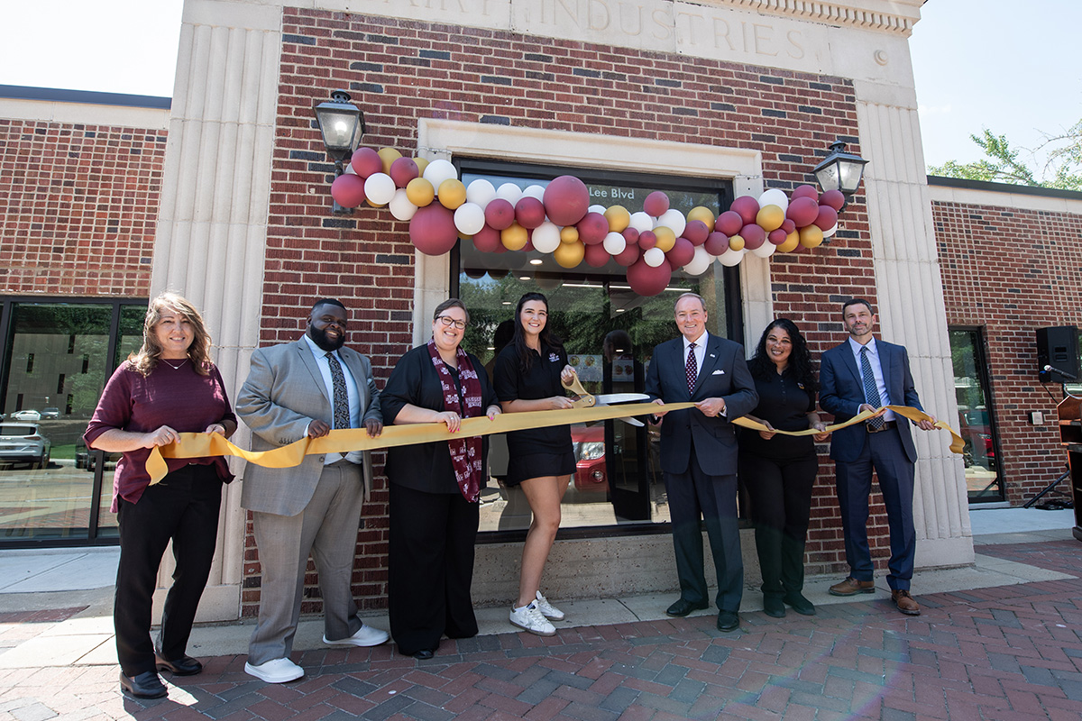 Celebrating a ribbon cutting in August for the openings of Subway and Bento Sushi eateries in a renovated campus location 