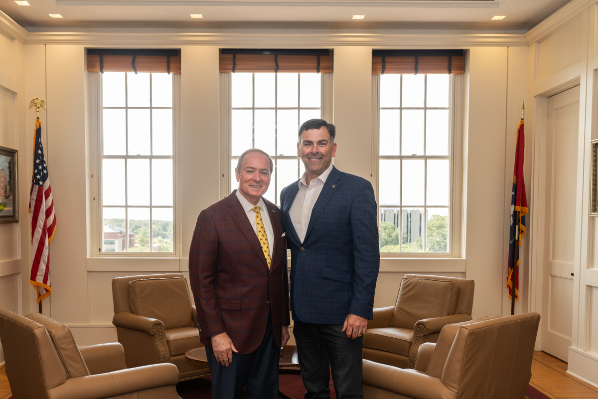 Mississippi Secretary of State Michael Watson, right, visited with MSU President Mark E. Keenum in September. 